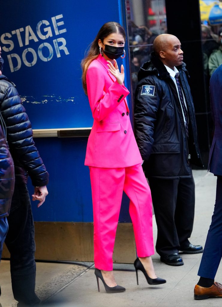 Hot pink trouser suit 